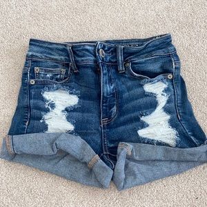 Blue Jean Shorts With Rips